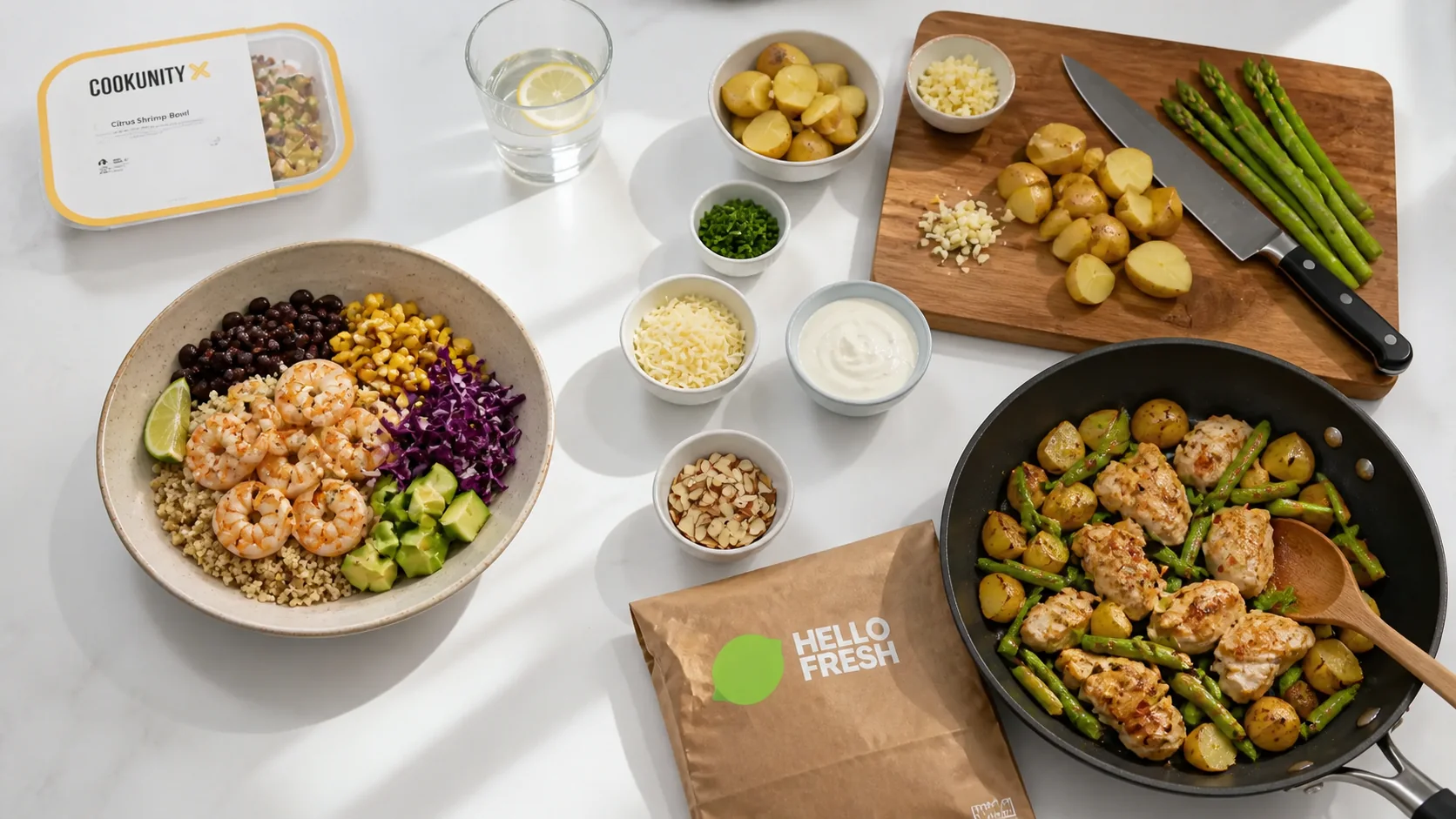 Finished CookUnity citrus shrimp bowl beside HelloFresh garlic chicken meal-kit preparation